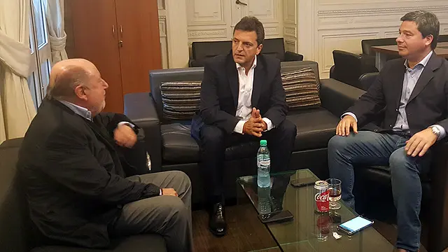 Ahora Busti volvió a mostrarse con Massa